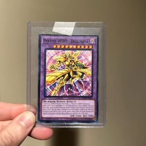 yugioh destiny hero dusktopia card 1st edition mint with card sleeve cover